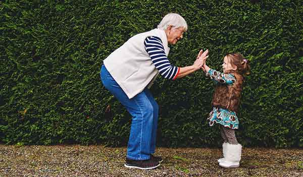 adult and child double high five