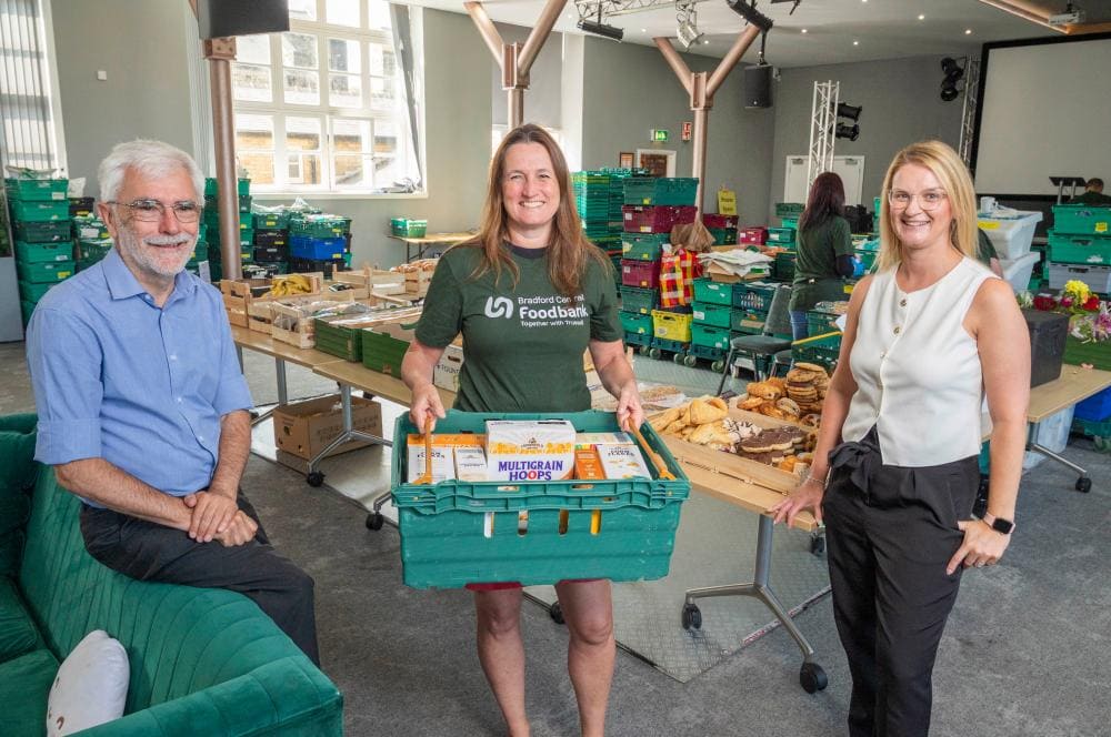 Neil Irving and Linzi Morgan, trustees of Yorkshire Building Society Charitable Foundation with Josie Barlow from Bradford Central Foodbank 