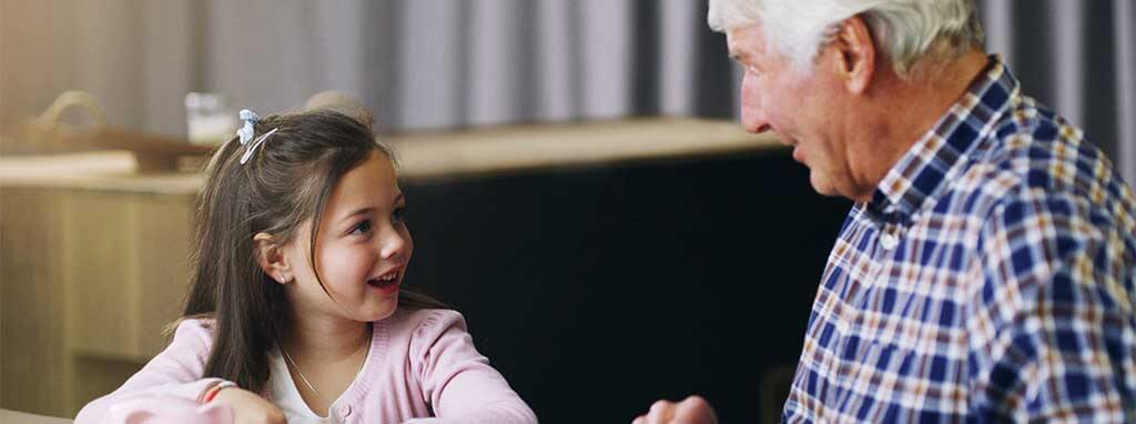 child talking to older person
