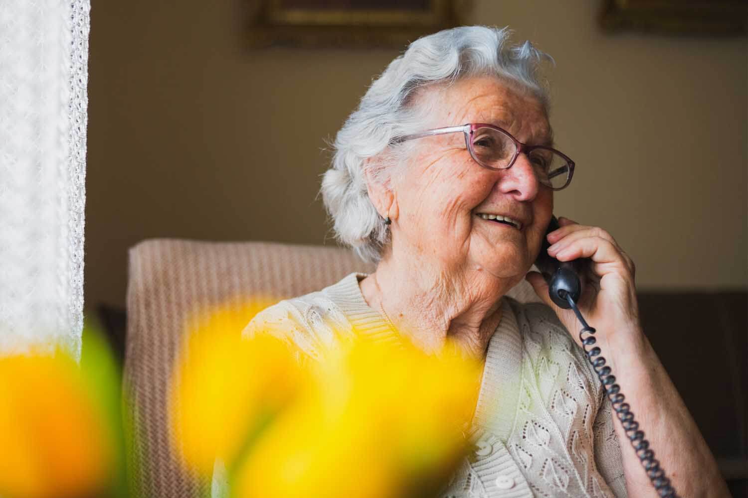 Old woman on telephone