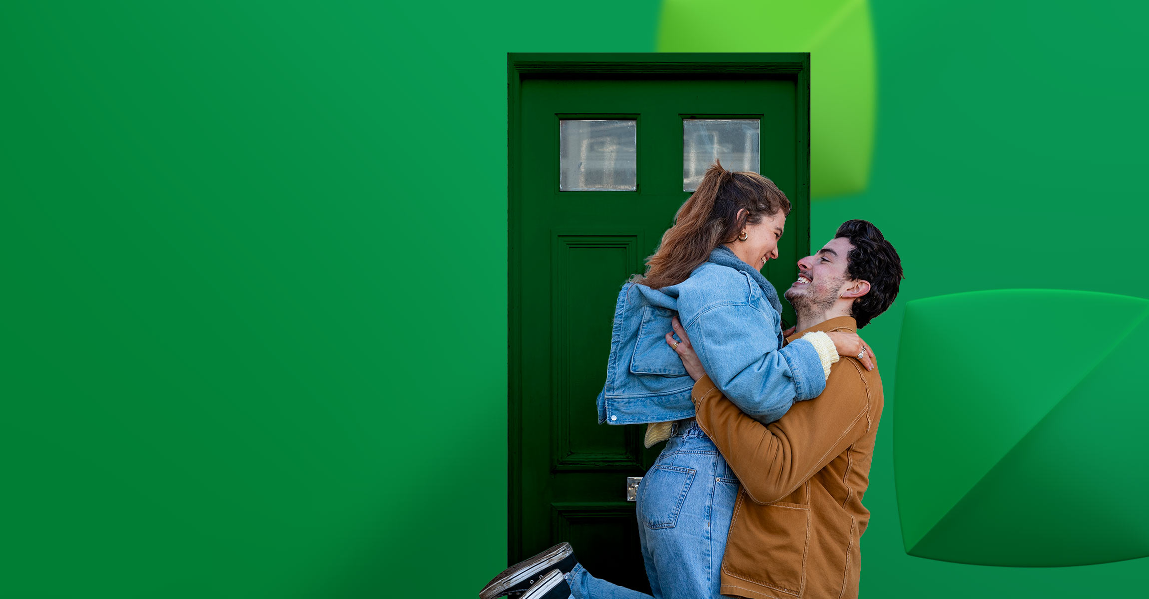 Man and woman next to green door
