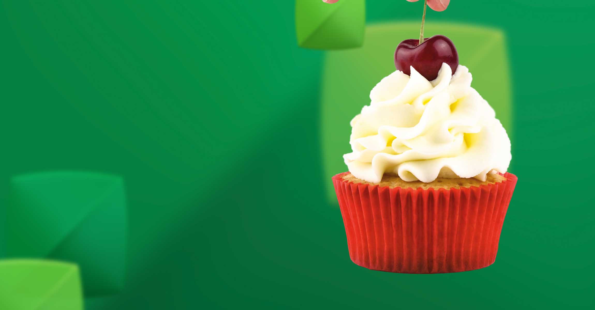 Bun with cherry and frosting