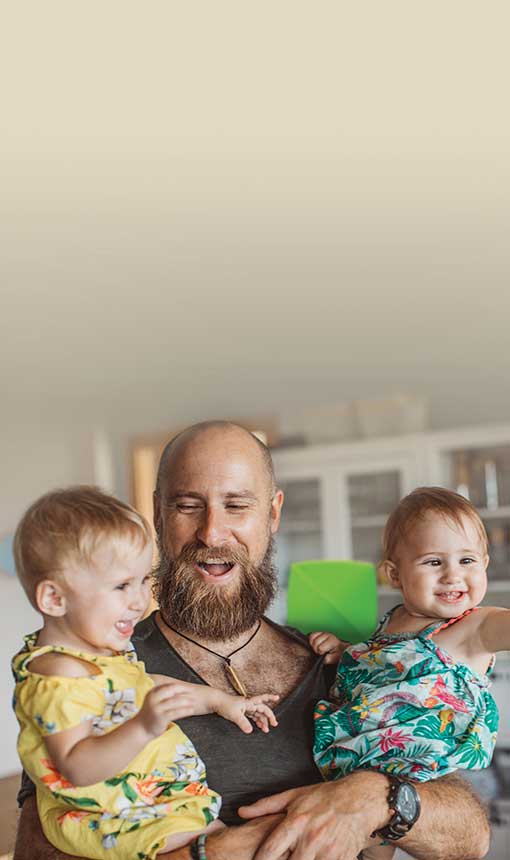 bearded man with young children