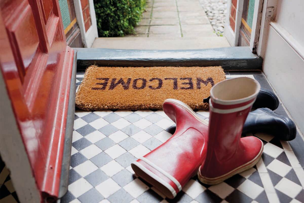 Boots and welcome mat