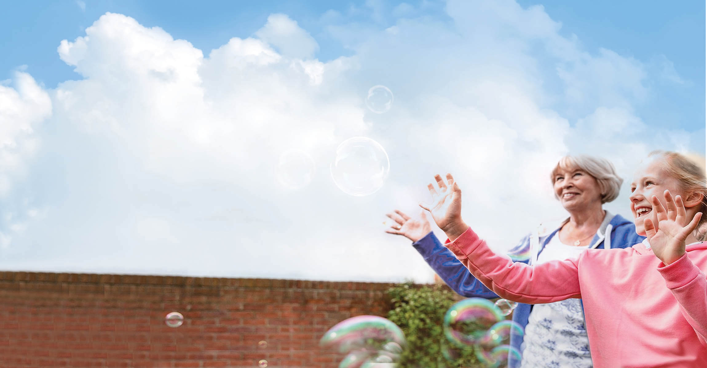 People with bubbles smiling