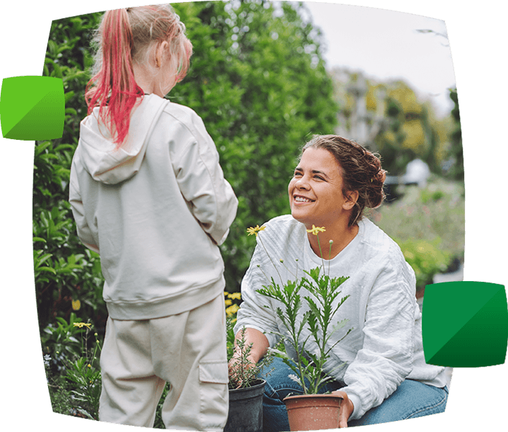 Mother and daughter with plants