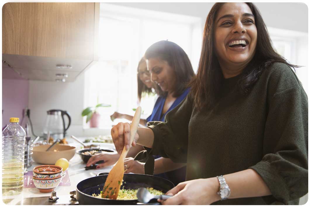 Family cooking in kitchen