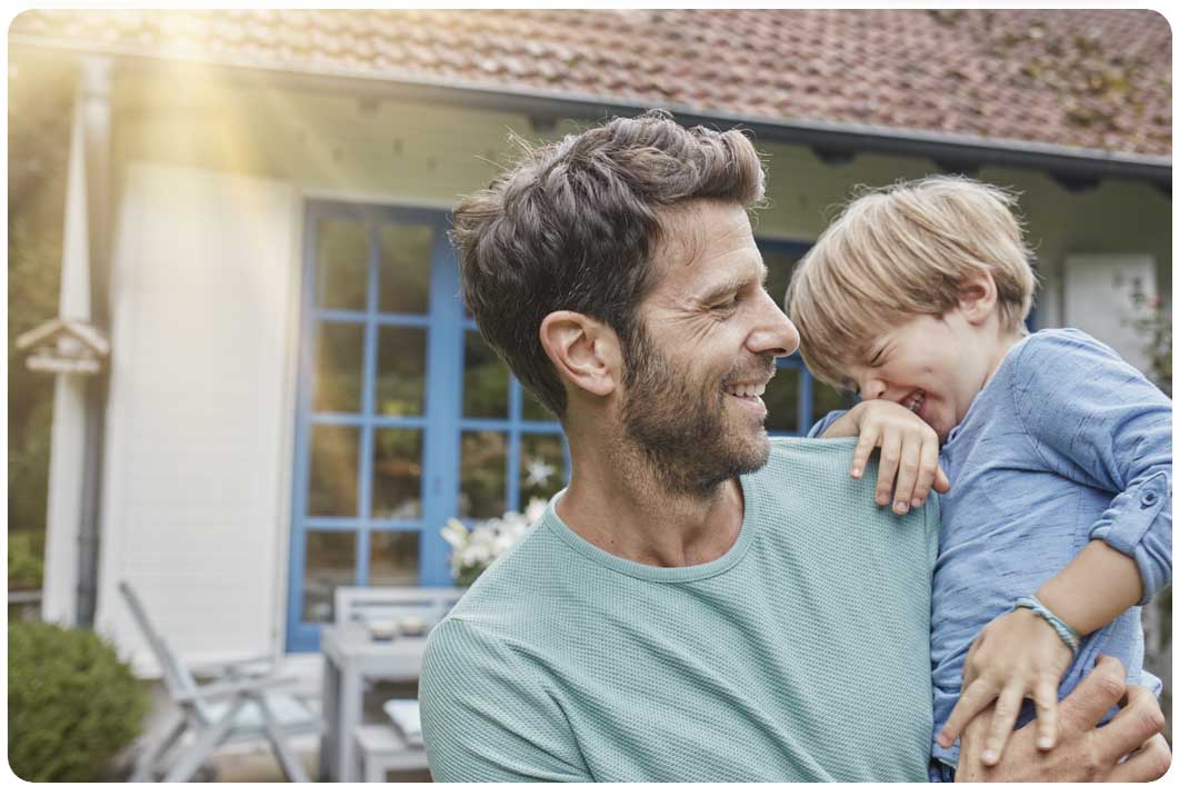 Man outside with son