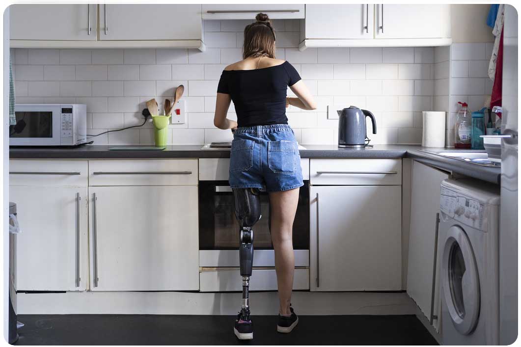 Woman standing in kitchen