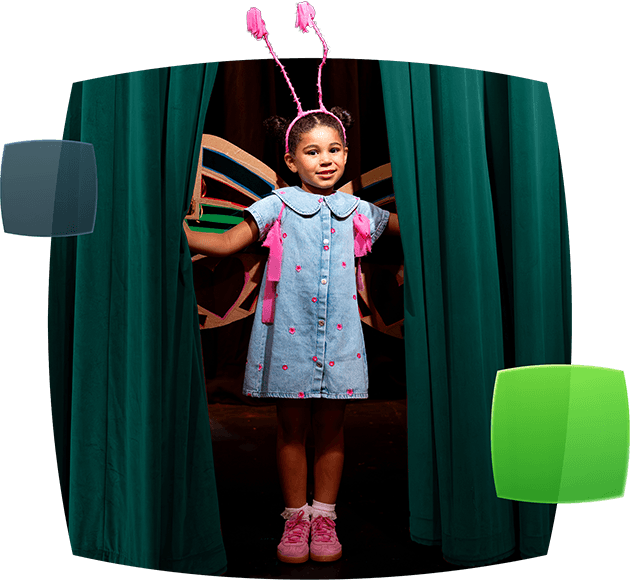 Girl dressed as butterfly opening curtains