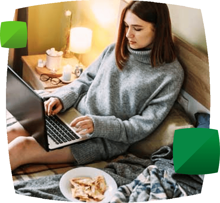 Woman with laptop and snacks