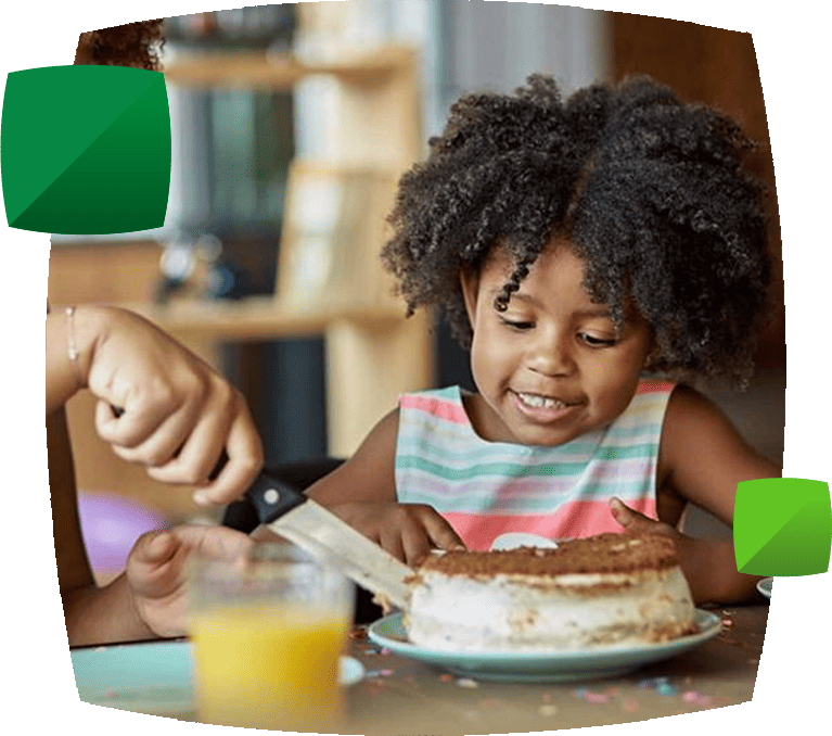 child watching cake being cut