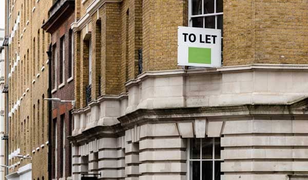 building with to let sign