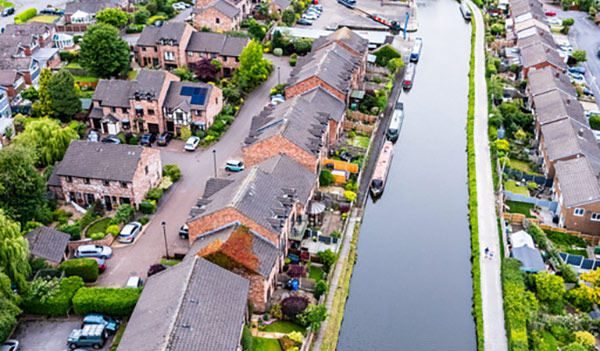 A river running through a urban residential area
